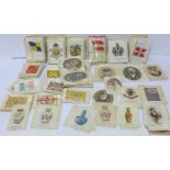 A collection of over 500 cigarette cards and cigarette silks