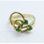 A 9ct gold, three green stone ring, 3.1g, P