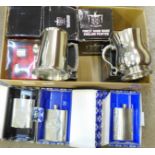 Three pewter hip flasks, five pewter tankards and two stainless steel egg cup sets, all boxed