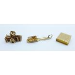 Three hallmarked 9ct gold charms, 7.3g