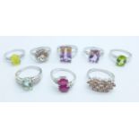 Eight silver stone set rings