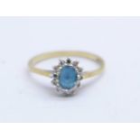 A 9ct gold, blue stone and diamond cluster ring, 1.8g, M