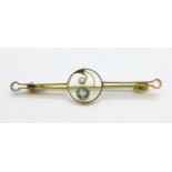 A 9ct gold brooch with pearl and blue stone, (metal pin), 1.8g