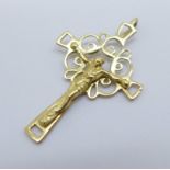 A 9ct gold crucifix, 1.2g