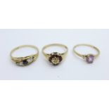 Three 9ct gold stone set rings, 4.2g