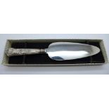 A Queens pattern cake knife, silver covered handle, Sheffield 1960