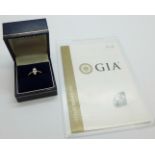 A platinum set marquise brilliant cut diamond solitaire ring, 0.59carat diamond weight, with GIA