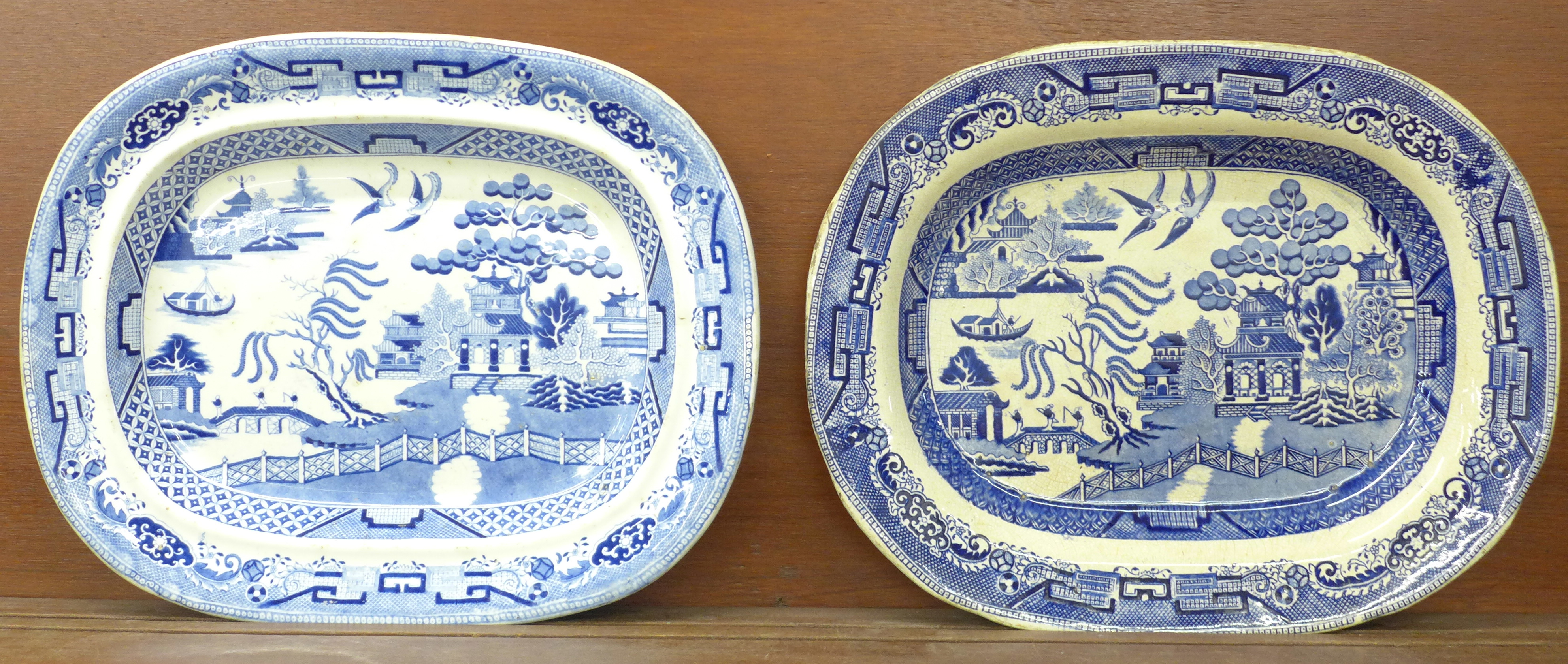 Two blue and white willow pattern meat plates, both a/f