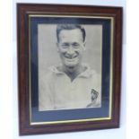 A framed signed picture of Preston North End and England footballer Tom Finney