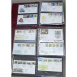 Four albums of first day covers, circa year 2000