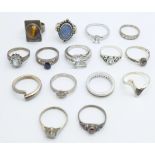 Fifteen silver rings including one doublet opal and one tigers eye set