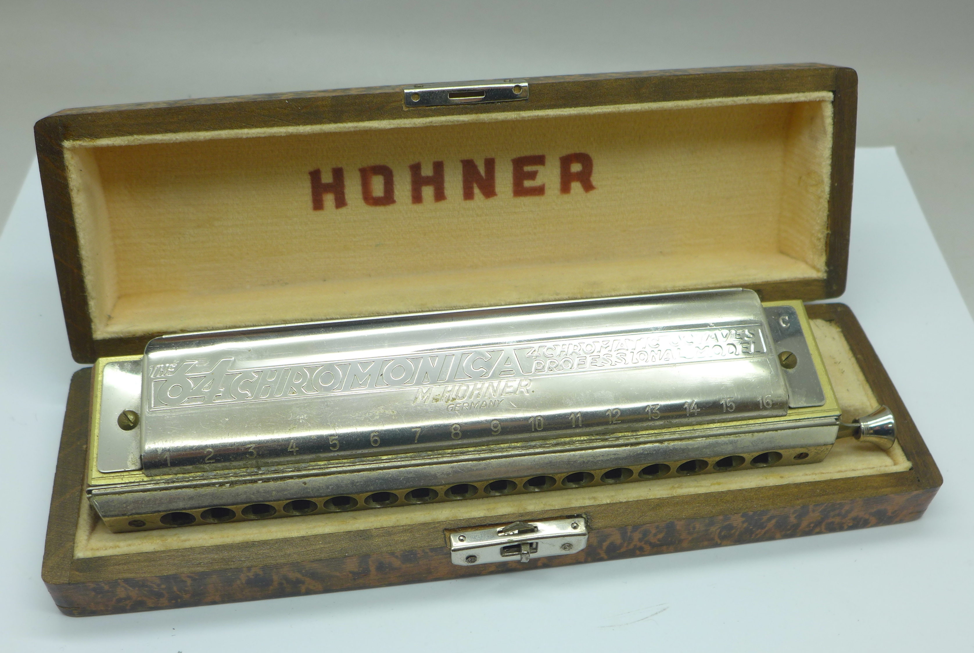 A Hohner 'The 64 Chromonica' Professional model harmonica, boxed