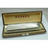 A Hohner 'The 64 Chromonica' Professional model harmonica, boxed