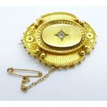 A 15ct gold and diamond brooch, 8.7g, 31mm x 51mm
