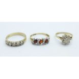 Three 9ct gold stone set rings, 5.8g