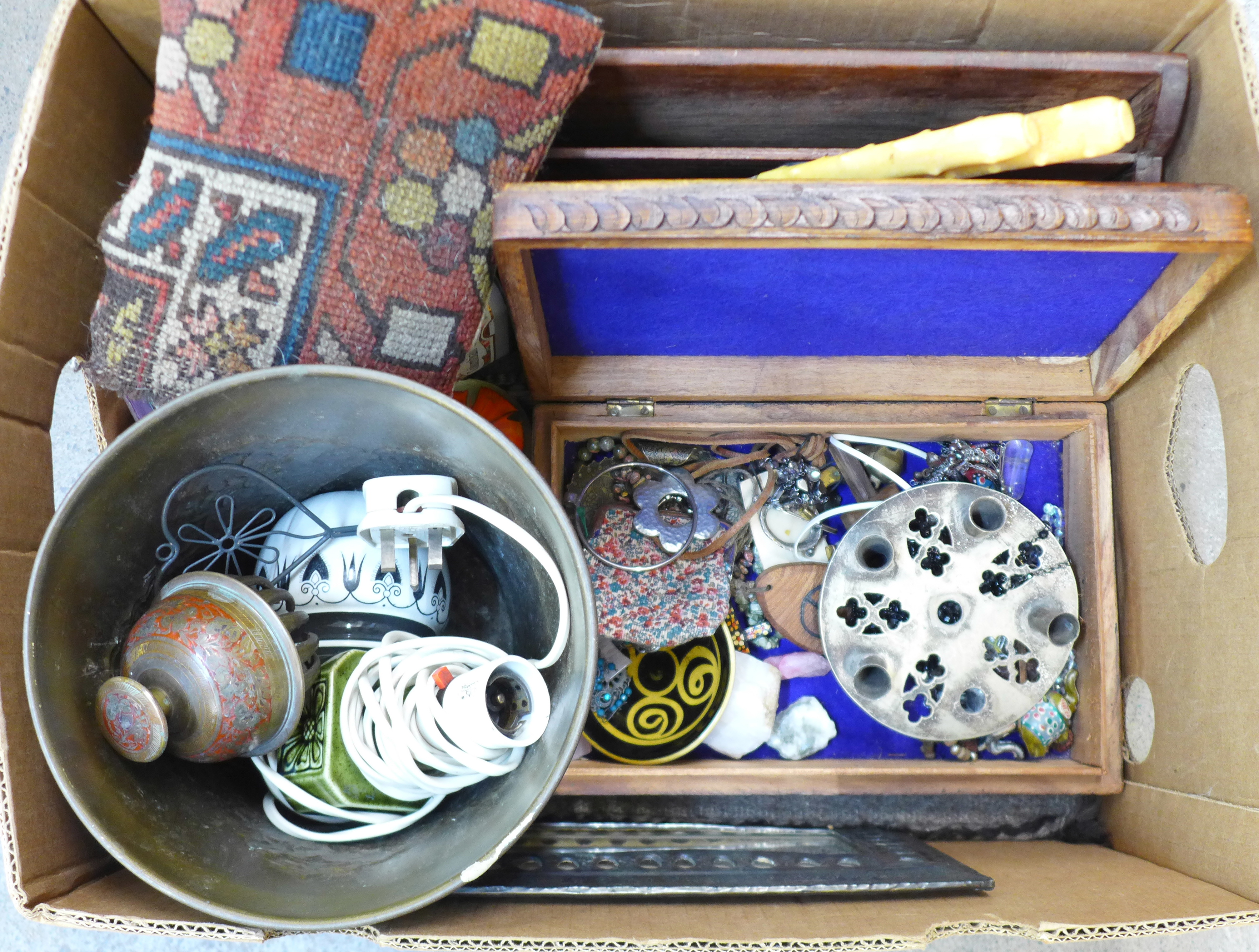 A box of assorted items, glass paperweights, a wooden box and letter rack, jewellery, etc.