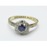 An 18ct gold, platinum set diamond and sapphire cluster ring, 2.9g, P