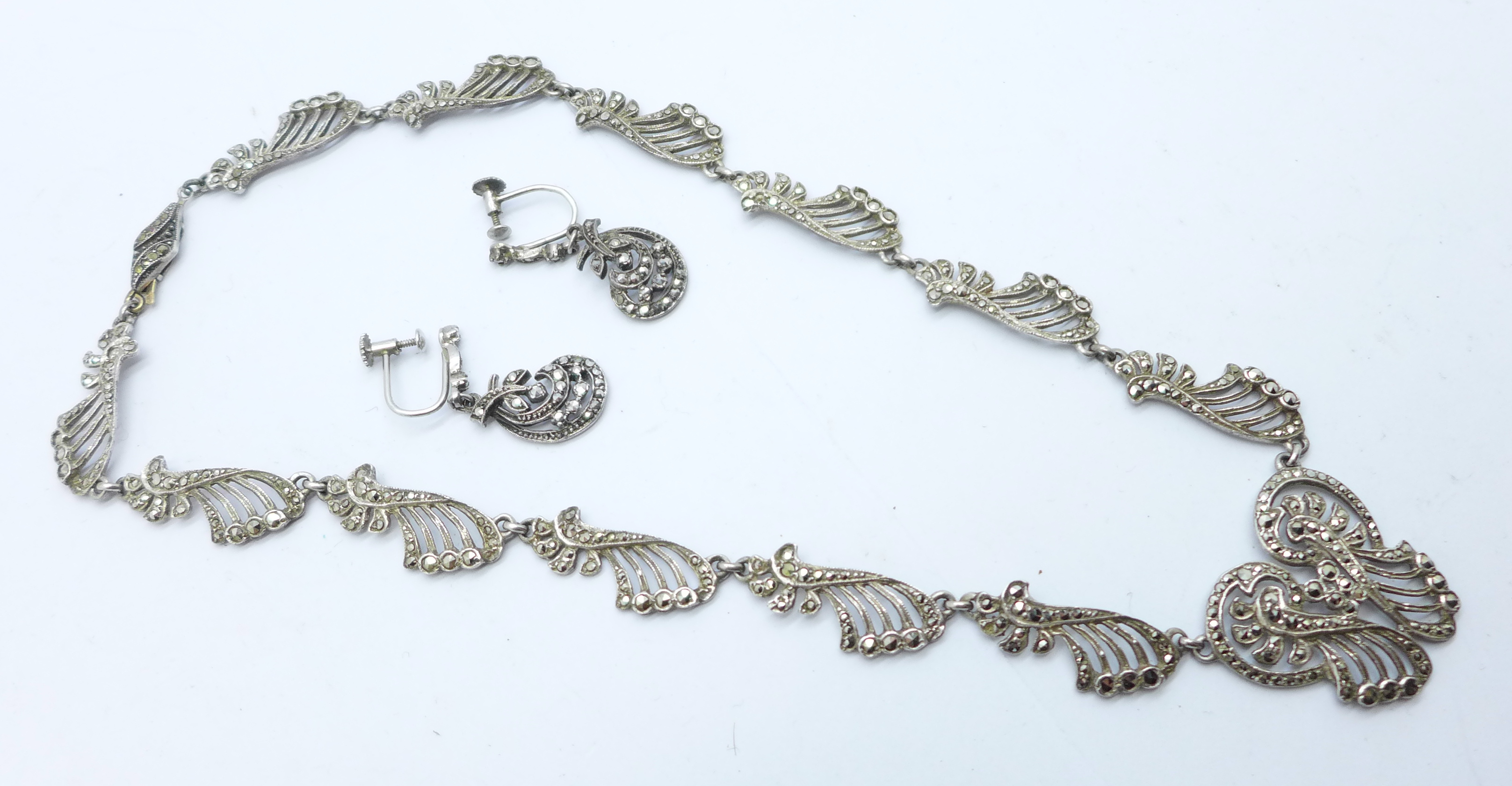A marcasite necklace and a pair of earrings