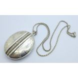 A large silver locket and chain, 40mm x 49mm