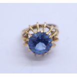 A 9ct gold and blue stone ring, 3.1g, G