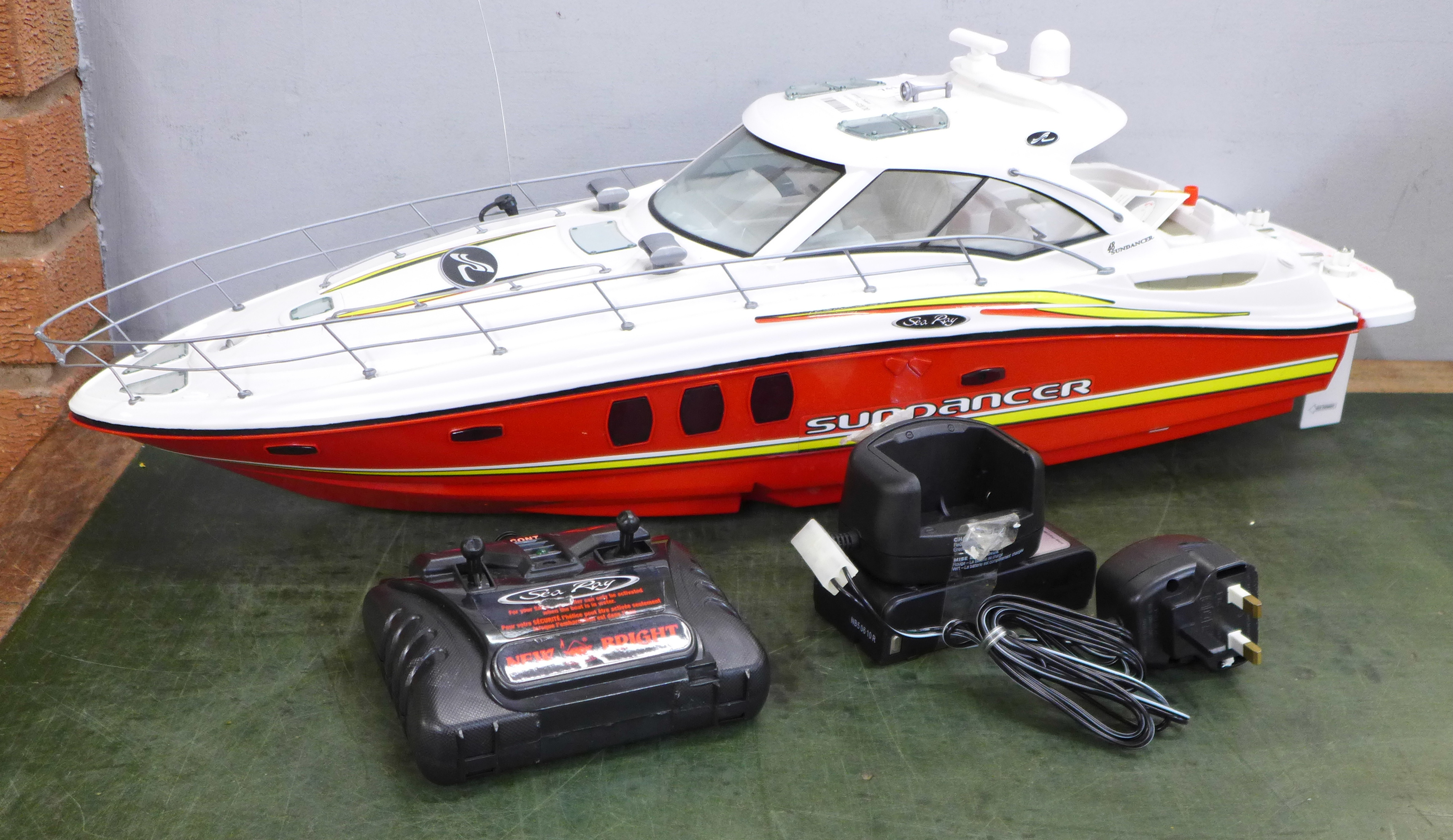 A Sea Ray Sundancer toy speedboat, 72cm