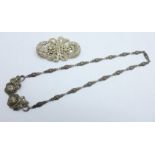 A silver and marcasite necklace and a silver set clip brooch