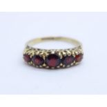 A 9ct gold and garnet ring, 2.4g, M