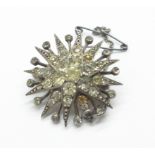 A .925 silver and paste set Starburst brooch