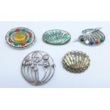 Five silver brooches