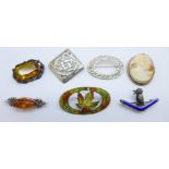 Seven brooches including a silver and enamel kookaburra and boomerang brooch, hallmarked