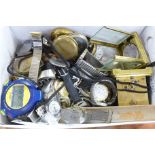 A collection of watch parts, movements, cases, carriage clock case and part movement, stopwatch,