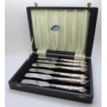 A cased set of six silver handled knives