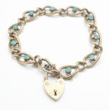 A 9ct gold bracelet inset with turquoise, 9.3g