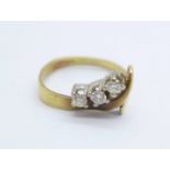 An 18ct gold, three stone diamond ring, 4.1g, P