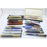 A collection of pens including Parker