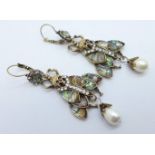 A pair of novelty abalone and paste set beetle earrings with 'skulls'