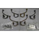 Six bronze wall mounted coat hooks