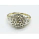 A 9ct gold and diamond cluster ring, 2.7g, O