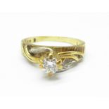 An 18ct gold and diamond solitaire ring, 4.6g, N, over 0.25carat diamond weight, (small chip to