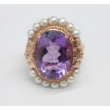 A silver gilt, amethyst and pearl ring, P