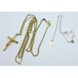 A 9ct gold crucifix, (2.1g), on a plated chain and a cross pendant on a fine 9ct gold chain