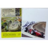 A 1964 German GP programme, with signed photograph of John Surtees driving the winning car