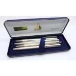 Four silver ballpoint pens including two Usus, Germany