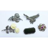 Five brooches including a silver and marcasite eagle brooch and a marcasite and multi-coloured gem