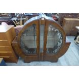 An Art Deco mahogany circular display cabinet