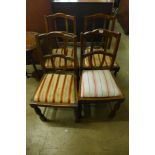 A set of four oak dining chairs