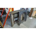 Two Victorian cast iron fire inserts