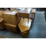 A teak bureau, TV stand and a bedside table