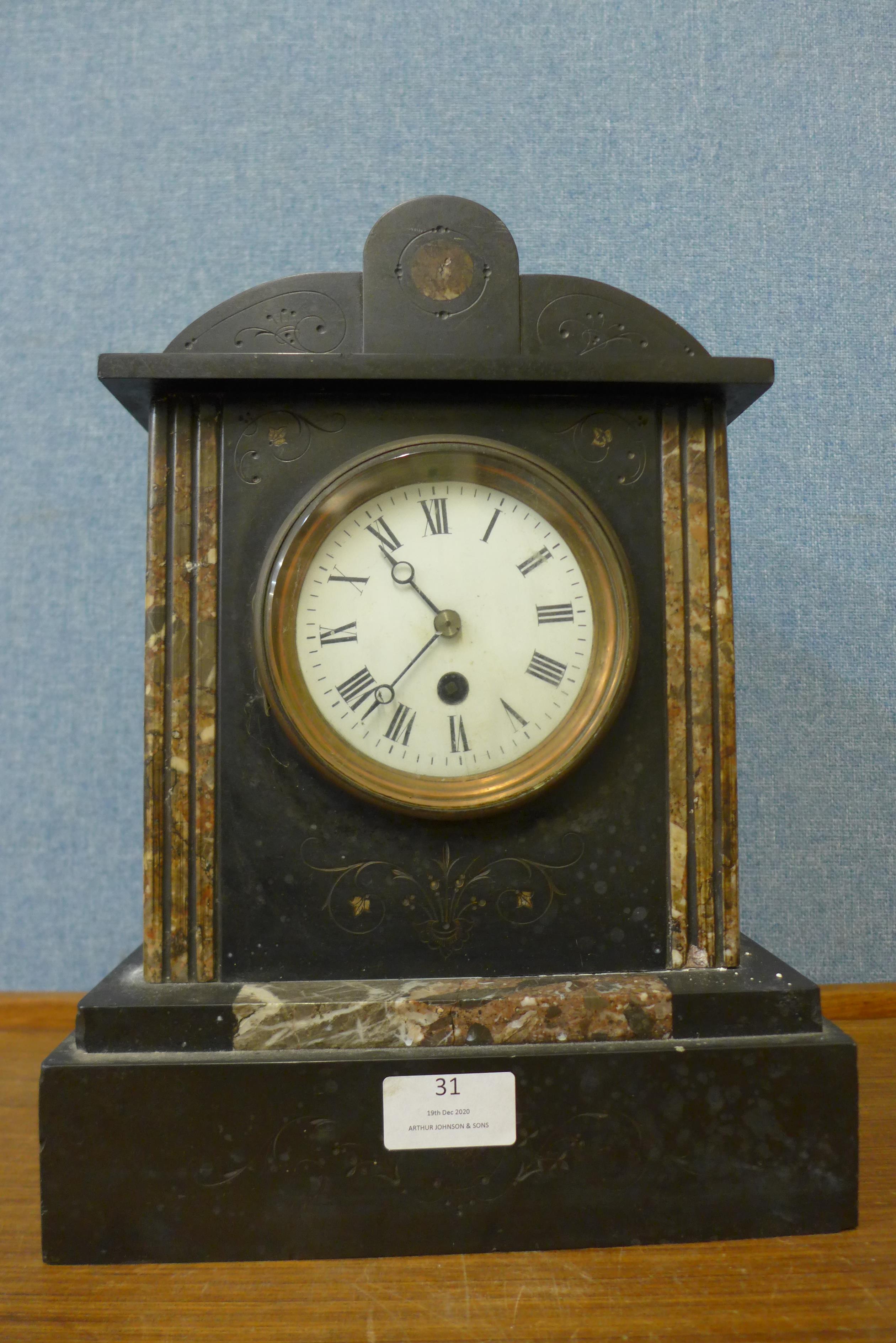 A 19th Century French Belge noir mantel clock