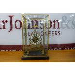 A cased brass fusee skeleton clock, 53cms h